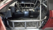 Huezo Racing custom fabricated 6-point roll cage with anti-intrusion doors on 1987 PONTIAC FIERO